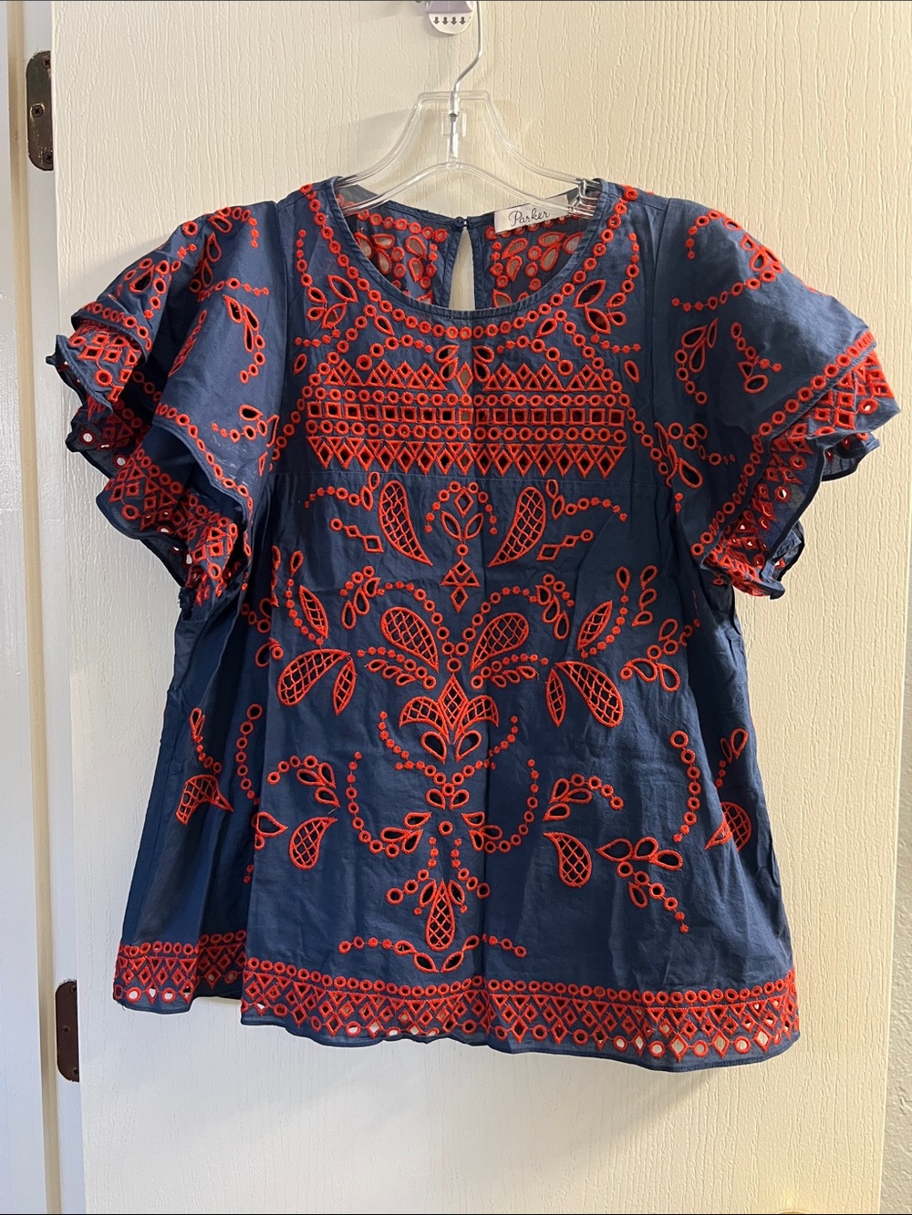 Parker Navy Top with Red Embroidered Floral Motif